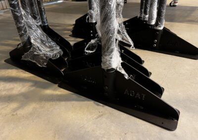 Stage lighting tower configured for overhead suspension